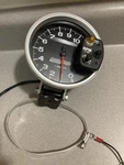 Auto Tachometer 233903 Gage 0-10000 Rpm, 5 In. Shift-lite. Fixed Price $140.00.
