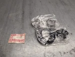 Nos Kawasaki MC1 Gauge Speedometer Bracket 25008-029. Fixed Price $22.00.