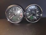 1974 Norton Speedometer And Tachometer 06-5638, 06-5643. Fixed Price $699.00.