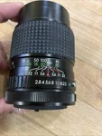Auto Pro Coated Optics Camera Lens 1:2.8 F=135MM 52MM No. 803410. Fixed Price $7.99.
